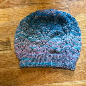 Lovely one of a kind hand knit beanie with chevron design in teals and pinks